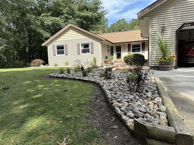 Finished West Michigan landscape bed and lawn by Upright Property Enhancement